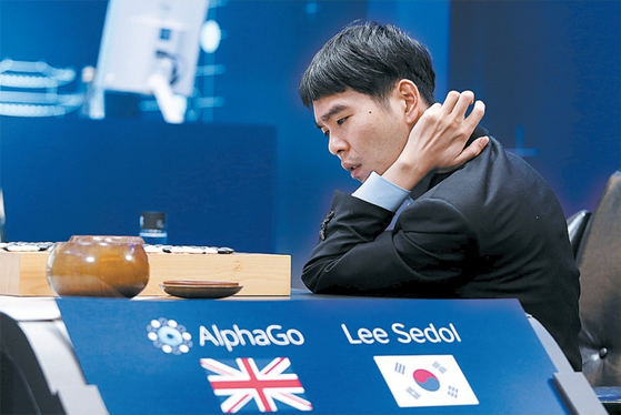 Lee Sedol playing against AlphaGo. Source: Google.
